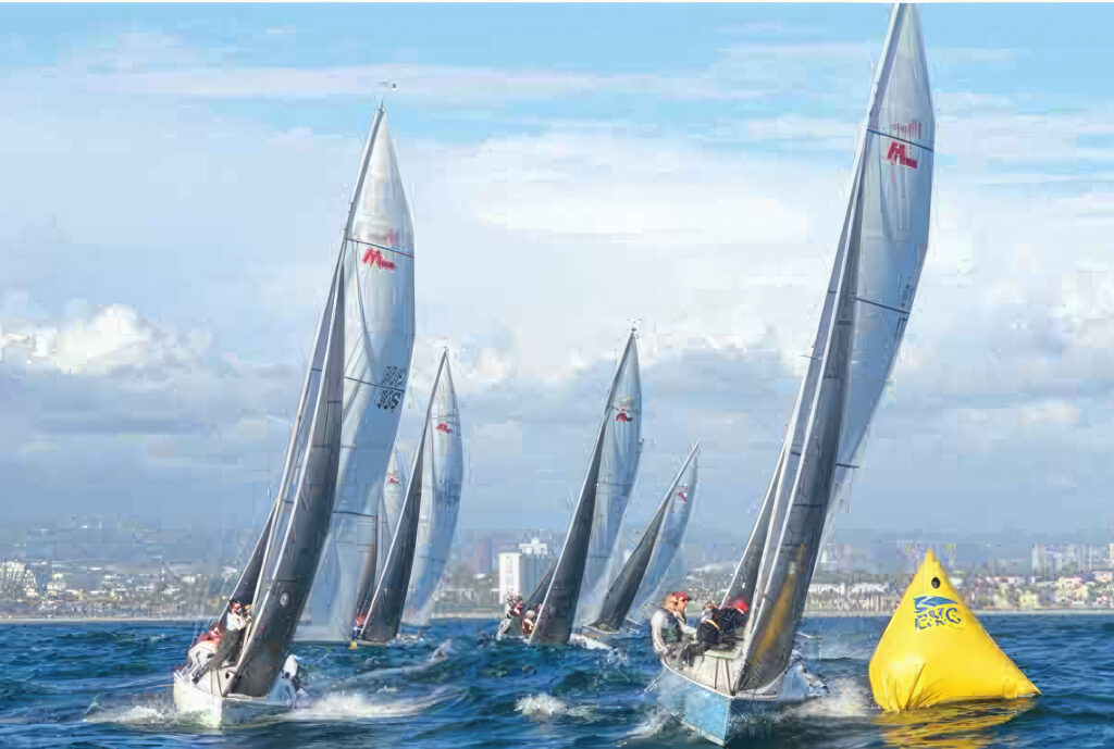 sailboats rounding a yellow mark